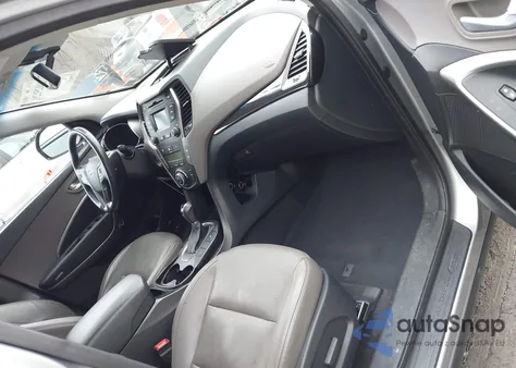 2014 Hyundai Santa Fe Limited z USA, uszkodzony, nr VIN KM8SNDHFXEU058476